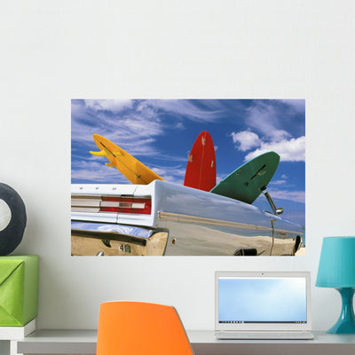 Colorful Surfboards Wall Mural shown on a wall