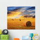 Golden sunset over farm field Wall Mural