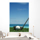 Golf Ball And Driver, Ocean In Blurred Background Wall Mural
