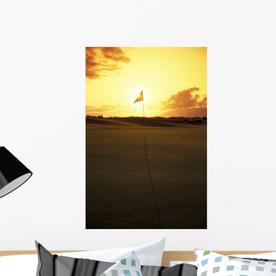 4th Hole Flag Sunset Wall Mural shown on a wall