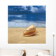 Close-Up Of Seashell On Beach With Ocean Soft Focus In Background A33D Wall Mural