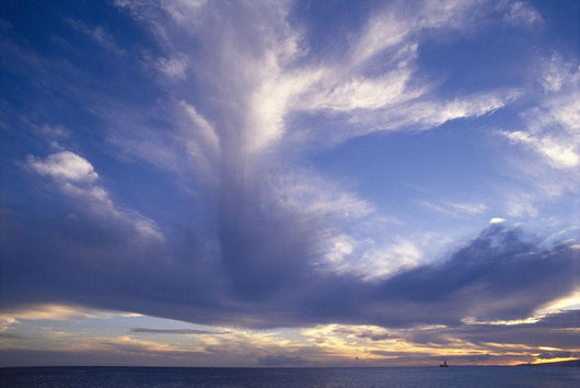Blue-Lavender Cloud Formations Over Ocean A35H Wall Mural