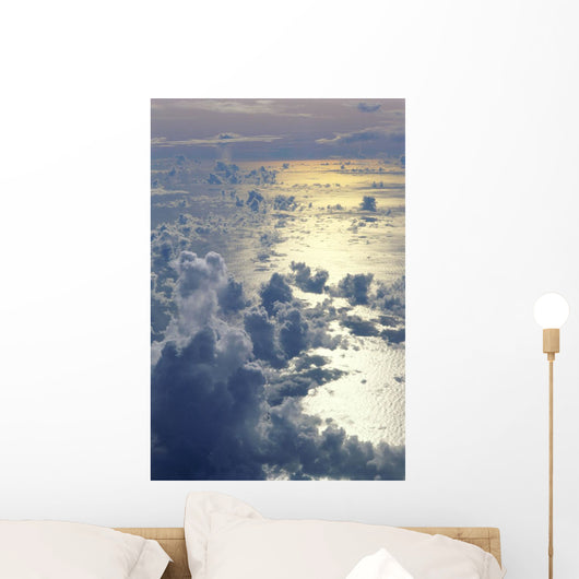 View From Above Clouds Over Ocean, Sun Reflections A35G Wall Mural