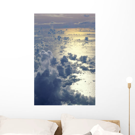 View From Above Clouds Over Ocean, Sun Reflections A35G Wall Mural