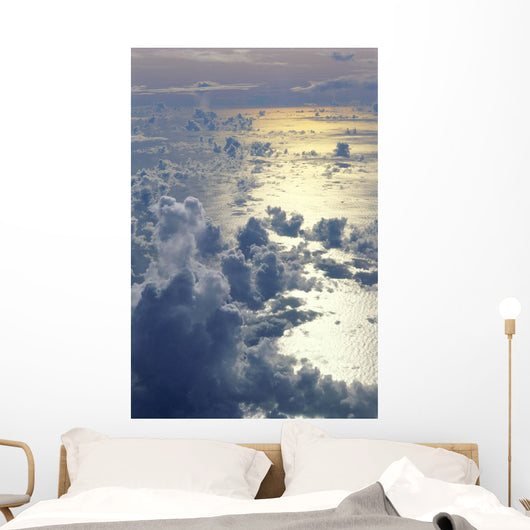 View From Above Clouds Over Ocean, Sun Reflections A35G Wall Mural