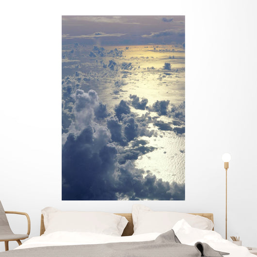 View From Above Clouds Over Ocean, Sun Reflections A35G Wall Mural