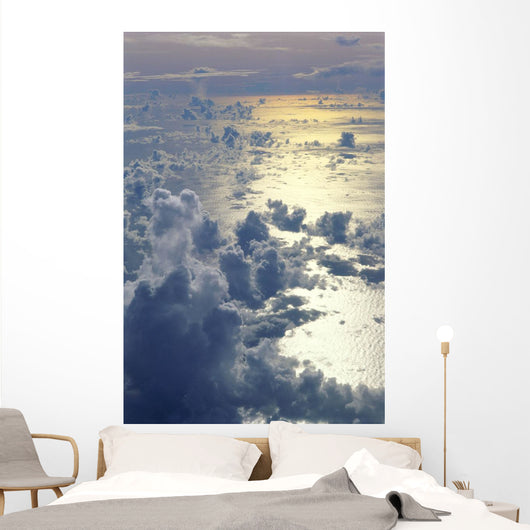 View From Above Clouds Over Ocean, Sun Reflections A35G Wall Mural