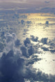 View From Above Clouds Over Ocean, Sun Reflections A35G Wall Mural