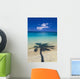 Shadow Of Palm Tree Onto Calm Beach Reef In Distance Wall Mural