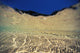 Underwater Reflections Along Sandy Bottom, At Surface Blue Sky Visible Wall Mural