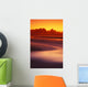 Beach At Sunset With Gentle Wave Rolling In Wall Mural