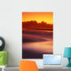 Beach At Sunset With Gentle Wave Rolling In Wall Mural