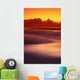 Beach At Sunset With Gentle Wave Rolling In Wall Mural
