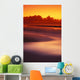 Beach At Sunset With Gentle Wave Rolling In Wall Mural