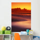 Beach At Sunset With Gentle Wave Rolling In Wall Mural