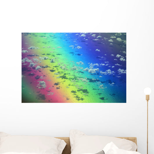 Polarized Rainbow And Aerial Of Clouds Over The Ocean Wall Mural