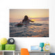 A Woman Laying On A Surfboard Watching The Sunset Wall Mural