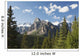 Mountain Vista With Cliff Face And Blue Sky And Clouds Wall Mural