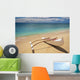 White Outrigger Canoe On Shoreline With Shadow, Calm Turquoise Water Wall Mural