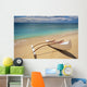 White Outrigger Canoe On Shoreline With Shadow, Calm Turquoise Water Wall Mural