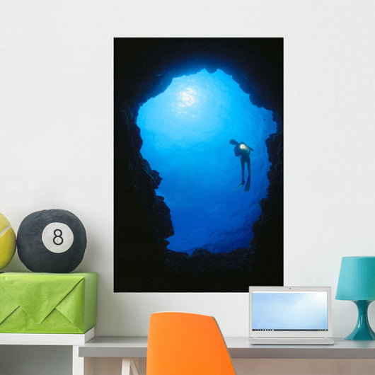 Hawaii, Silhouetted Diver At Cavern Entrance With Flashlight, Sunburst Wall Mural
