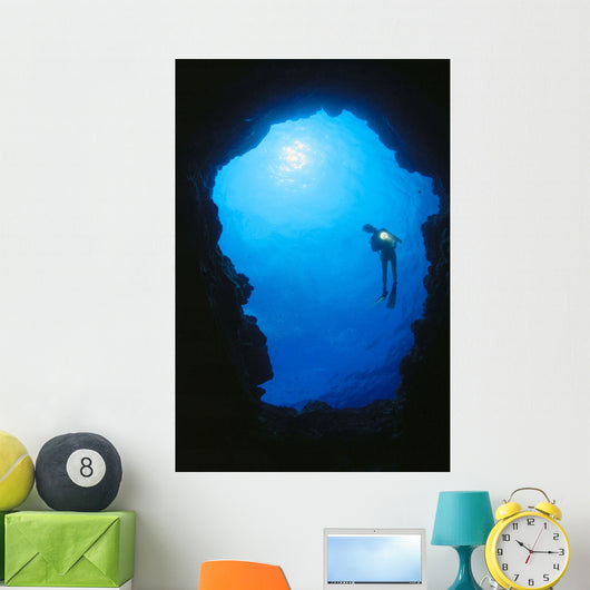 Hawaii, Silhouetted Diver At Cavern Entrance With Flashlight, Sunburst Wall Mural