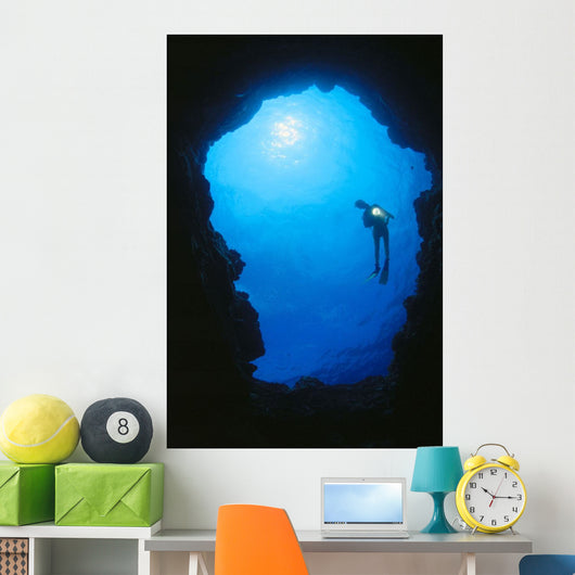 Hawaii, Silhouetted Diver At Cavern Entrance With Flashlight, Sunburst Wall Mural