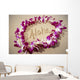 Close-Up Detail Of Purple Orchid Lei On Beach Aloha Written Wall Mural
