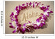 Close-Up Detail Of Purple Orchid Lei On Beach Aloha Written Wall Mural