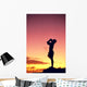 Man Silhouetted At Sunset, Conch Shell Blower Wall Mural
