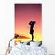 Man Silhouetted At Sunset, Conch Shell Blower Wall Mural