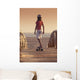 A Young Person Skateboarding With Bare Feet Wall Mural