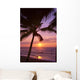 Couple In Distance On Beach Shoreline At Sunset Wall Mural