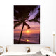 Couple In Distance On Beach Shoreline At Sunset Wall Mural