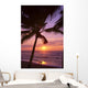 Couple In Distance On Beach Shoreline At Sunset Wall Mural