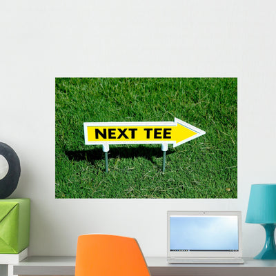 Next Tee Sign Wall Decal shown on a wall