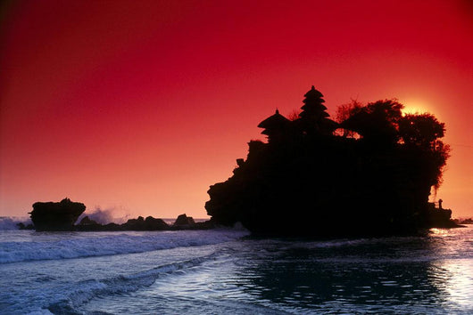 Indonesia, Bali, Tanah Lot Silhouetted By Dramatic Red Sunset Skies Wall Mural