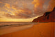 Woman Walk Shoreline Footprints Puffy Clouds Wall Mural
