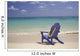 Plumeria Lei Hanging Over Blue Beach Chair Along Shoreline Wall Mural