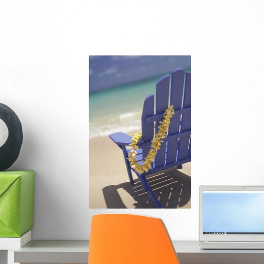 Close-Up Side Of Blue Beach Chair With Plumeria Hanging On Side Wall Mural