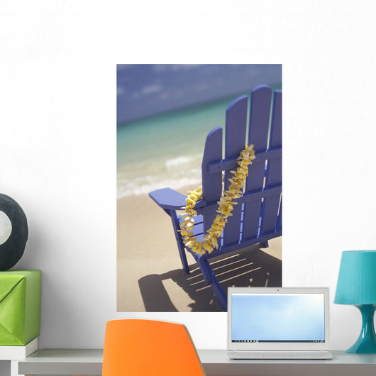 Close-Up Side Of Blue Beach Chair With Plumeria Hanging On Side Wall Mural