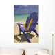 Close-Up Blue Beach Chair With Plumeria Hanging On Side Facing Ocean Wall Mural