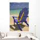 Close-Up Blue Beach Chair With Plumeria Hanging On Side Facing Ocean Wall Mural