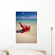 Red Beach Chair Along Shoreline, Turquoise Ocean, Calm Wall Mural