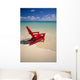 Red Beach Chair Along Shoreline, Turquoise Ocean, Calm Wall Mural
