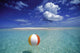 Calm Ocean With Beach Ball Foreground Wall Mural
