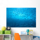 School Of Small Silver Fish, Hundreds In Clear Blue Water Near Surface Wall Mural
