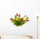 Dutch tulips in glass vase over white background Wall Mural