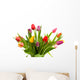 Dutch tulips in glass vase over white background Wall Mural