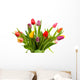 Dutch tulips in glass vase over white background Wall Mural
